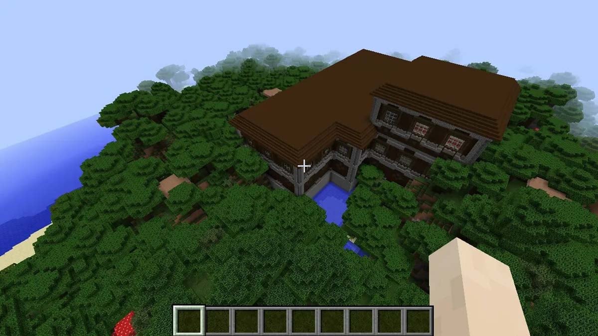Minecraft の海の近くの森の邸宅