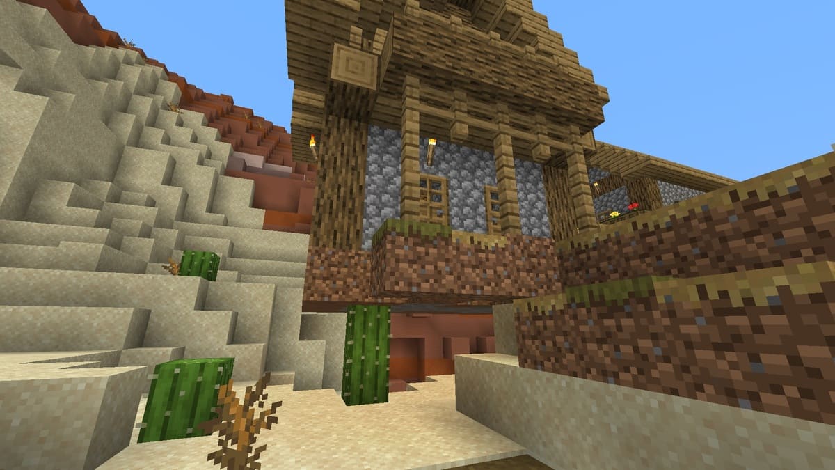 A hut stands on a cactoo in Minecraft