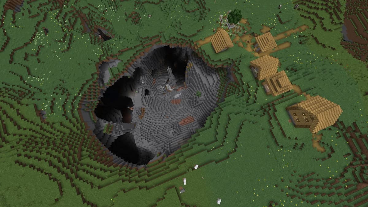 Giant pit and village in Minecraft