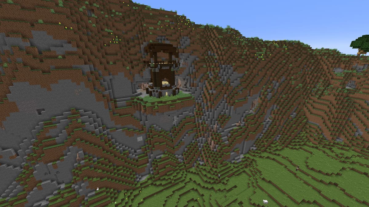 Avant-poste de pillards à l'intérieur d'une grotte dans Minecraft
