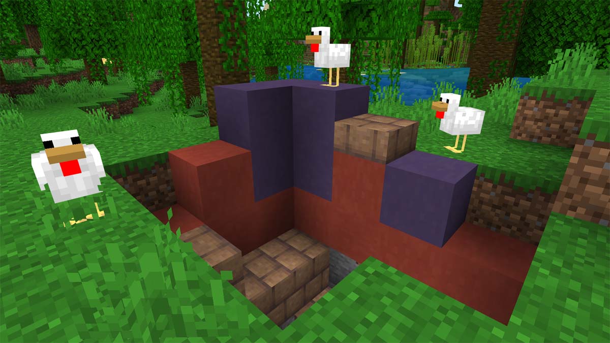 Chickens sitting on top fo colorful blocks in Minecraft