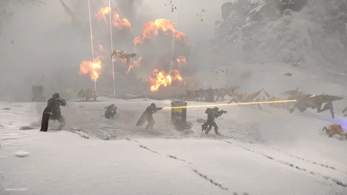 Players running across a battlefield