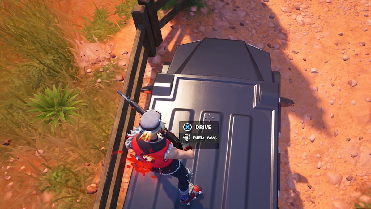 On top of a car in Fortnite with enter option on screen via the roof