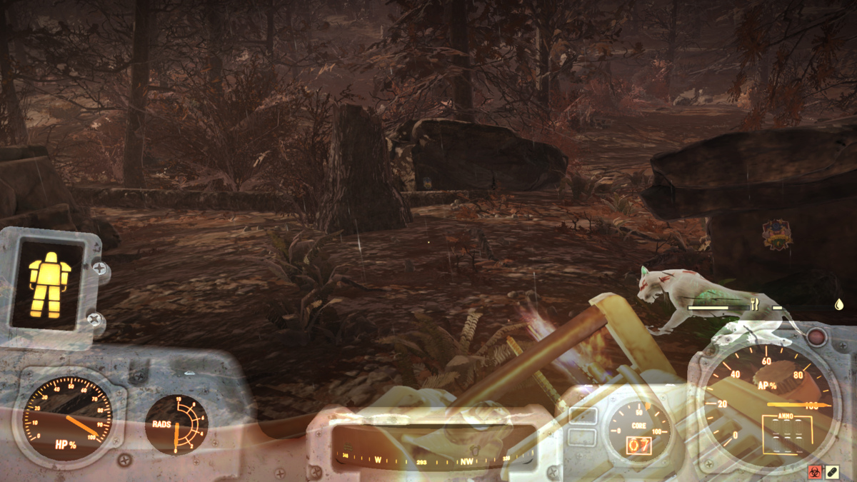 Three rocks with a tree stump in the center in Fallout 76