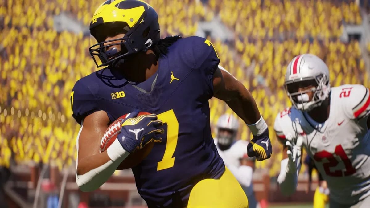 College football player runs with a ball in his hands