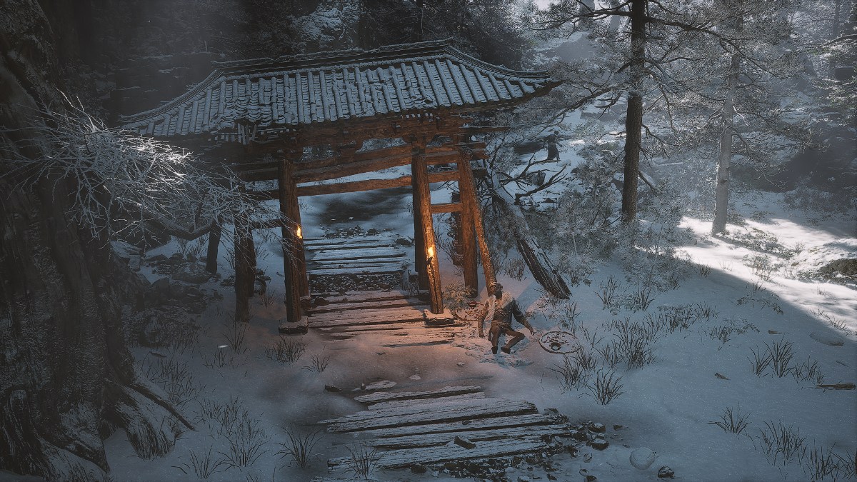 A wooden gate surrounded by snow in Black Myth: Wukong