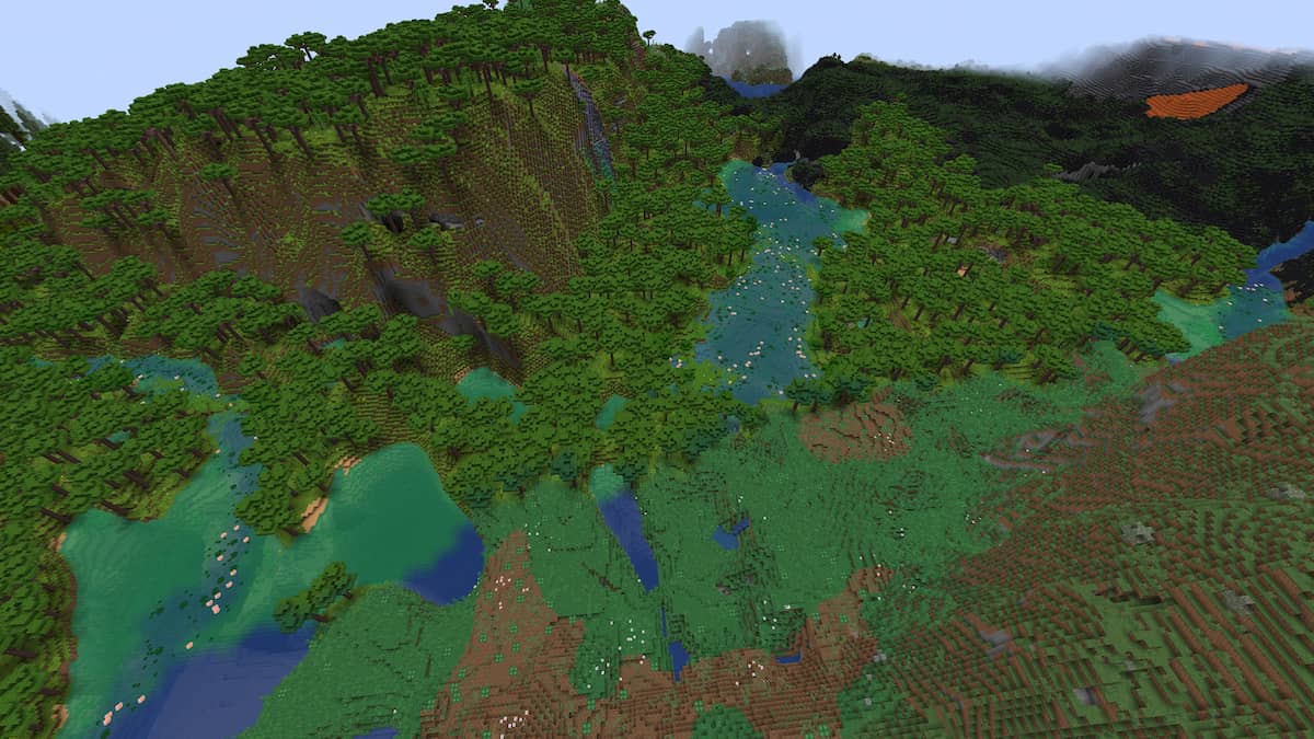 Rainforest and Overgrown Greens biomes next to a Volcanic Plains biome in Minecraft