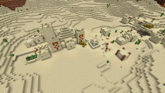 A Minecraft Desert Village with a Desert Temple inside of two of the buildings