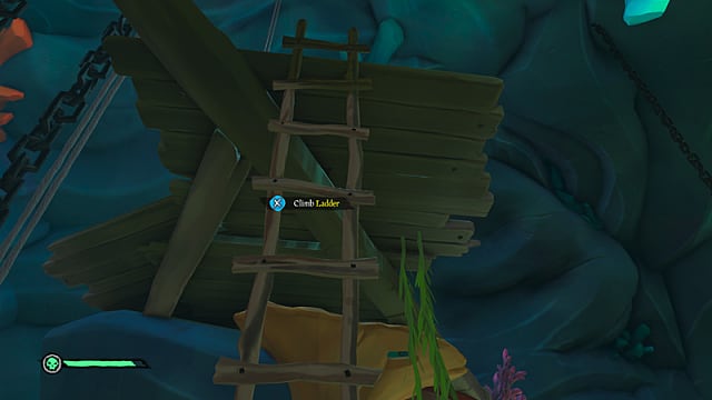 A wooden ladder leading up to a platform with blue action button.